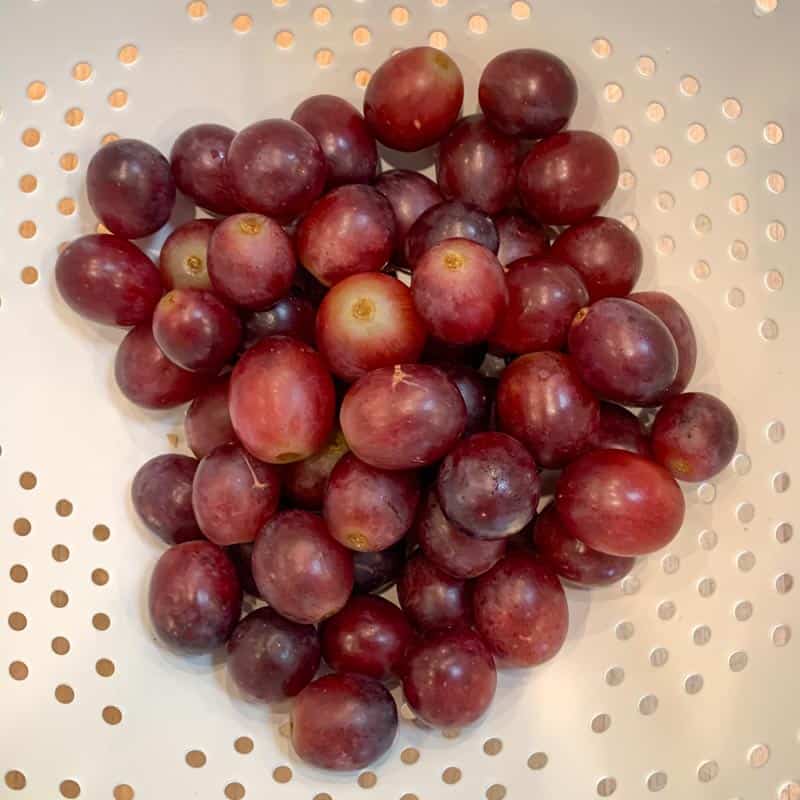 red grapes after soaking in vinegar solution